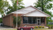 <b>Branchville - 29432 - </b>Can't really tell this is a Post Office from this shot. The Blue Box is off to the right and the big silver letters spelling out USPO, city and the zip are hidden behind that Palmetto tree. (5/13/07) Branchville - 29432