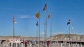 <b>4 Corners - </b>The Indians have erected this large stone square with flags and state seals and such at the only point in the US where the borders of 4 states meet. During the summer those booths in the background are full of vendors selling trinkets. There were only a few open for our visit. (04/22/09) 4 Corners