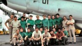 <b>Group Photo - </b>Here is a group photo shot of our whole detachment (minus a couple guys) on the flight deck in front of our plane. You've met most of them before in the Crowded bus photo. That is me, 4th from the right in the back row, standing next to Keith. The photo was taken by the ship's photographer for the Cruise Book (think HS Yearbook.) He took the shot with his camera and then with probably 10 more cameras that belonged to the subjects. Group Photo
