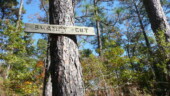 <b>Swampy Cut - </b> This sign is probably the oldest of the four along a short stretch of trail. One, it looks it age-wise and two, the other three say Swampy Cut Line... (11/08/09) Swampy Cut