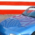 From 18 years ago, our '95 next to freshly repainted flag mural in Aiken, SC. (6/8/20)