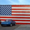 From 18 years ago, our '95 next to freshly repainted flag mural in Aiken, SC. (6/8/20)