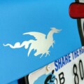 The only sticker we "heart" enough to put on the outside of the car is the dragon from Deals Gap. The rest go inside the trunk lid. (6/21/20)
