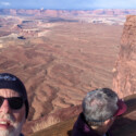 <b>Selfie at the Green River Overlook</b> - I said let's take a selfie and she said, "Sure, let me know when to smile." Because of where the sun is I can't really see the phone screen, so I'm estimating where I should hold it. When I think I'm ready, I say, "Smile." Where then my camera shy wife takes her cue and turns away... (03/30/22)