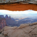 <b>View Through Mesa Arch</b> - You can see how nice it would be to watch a sunrise from here. The way the sun would come over that far ridge and slowly illuminate the valley below would be spectacular. (03/30/22)