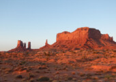 <b>Monument Valley</b> - The low angle sunrise did enhance the color of a couple of spots. (05/10/2018)